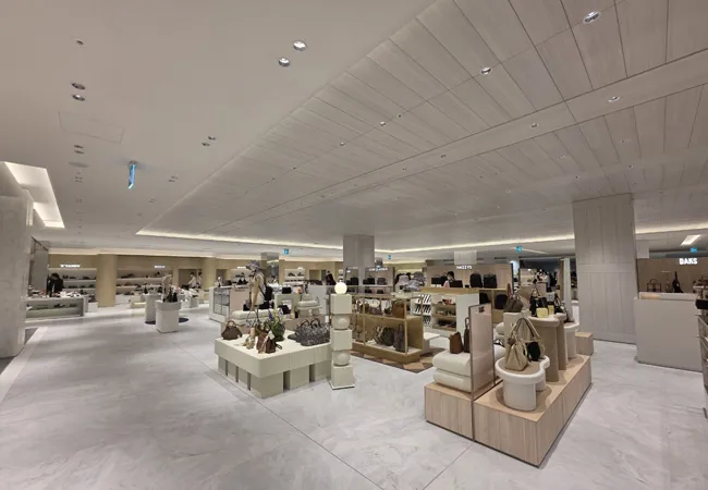 DL01 20W anti-glare downlights over boutique clothing rack area
