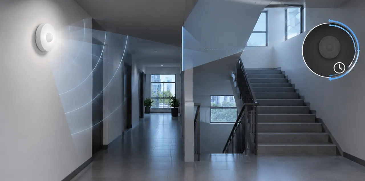 Sensor bulkhead in corridor showing PIR and microwave coverage for stairwell bulkhead